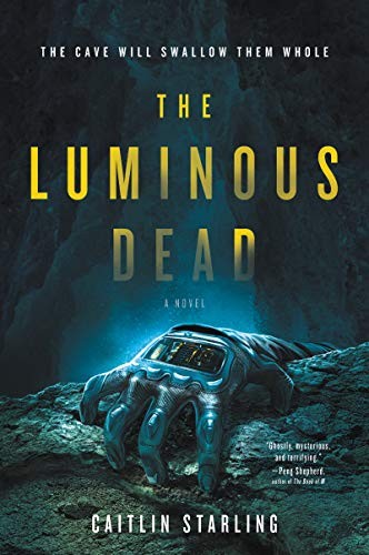 The Luminous Dead cover by Caitlin Starling - cave-diving horror where the villain exists only as a voice on the line